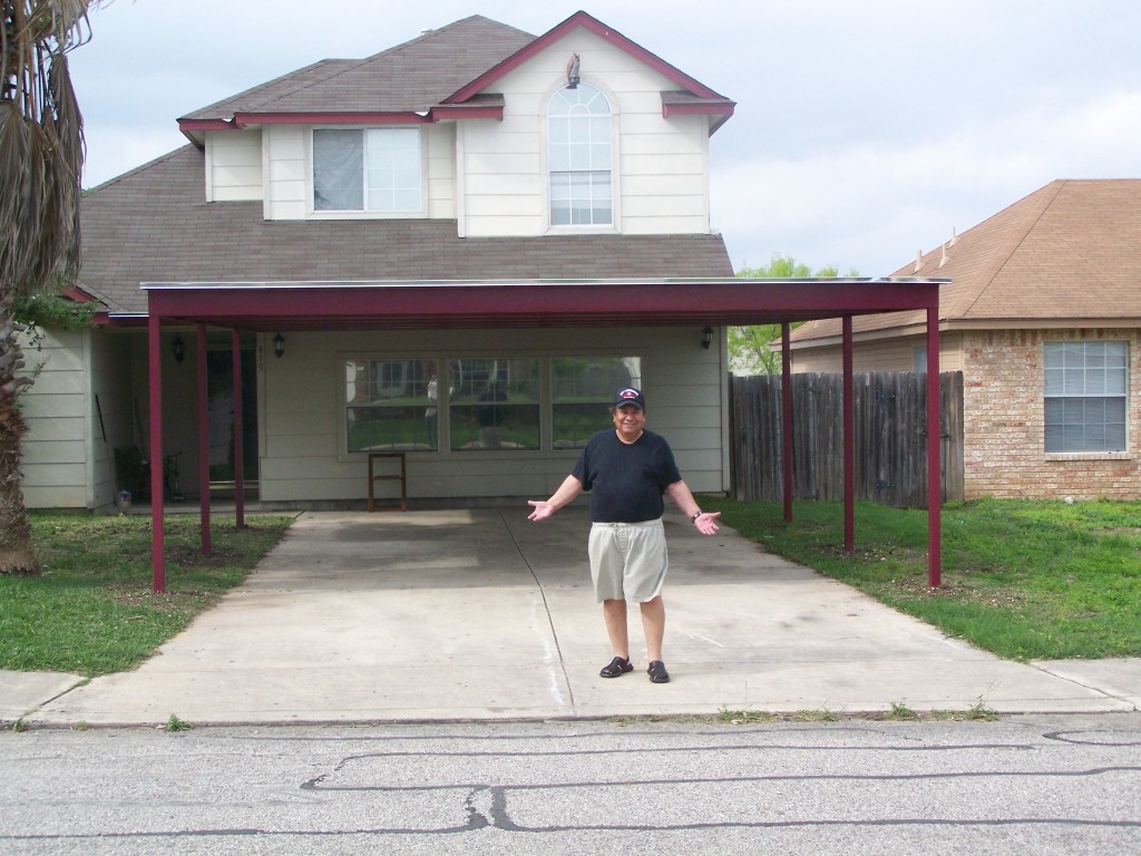 Metal carport with 6x8 porch addition attached to the home, South San Antonio - front view