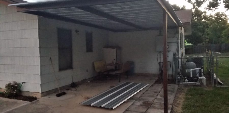 Two custom sized awnings attached to home