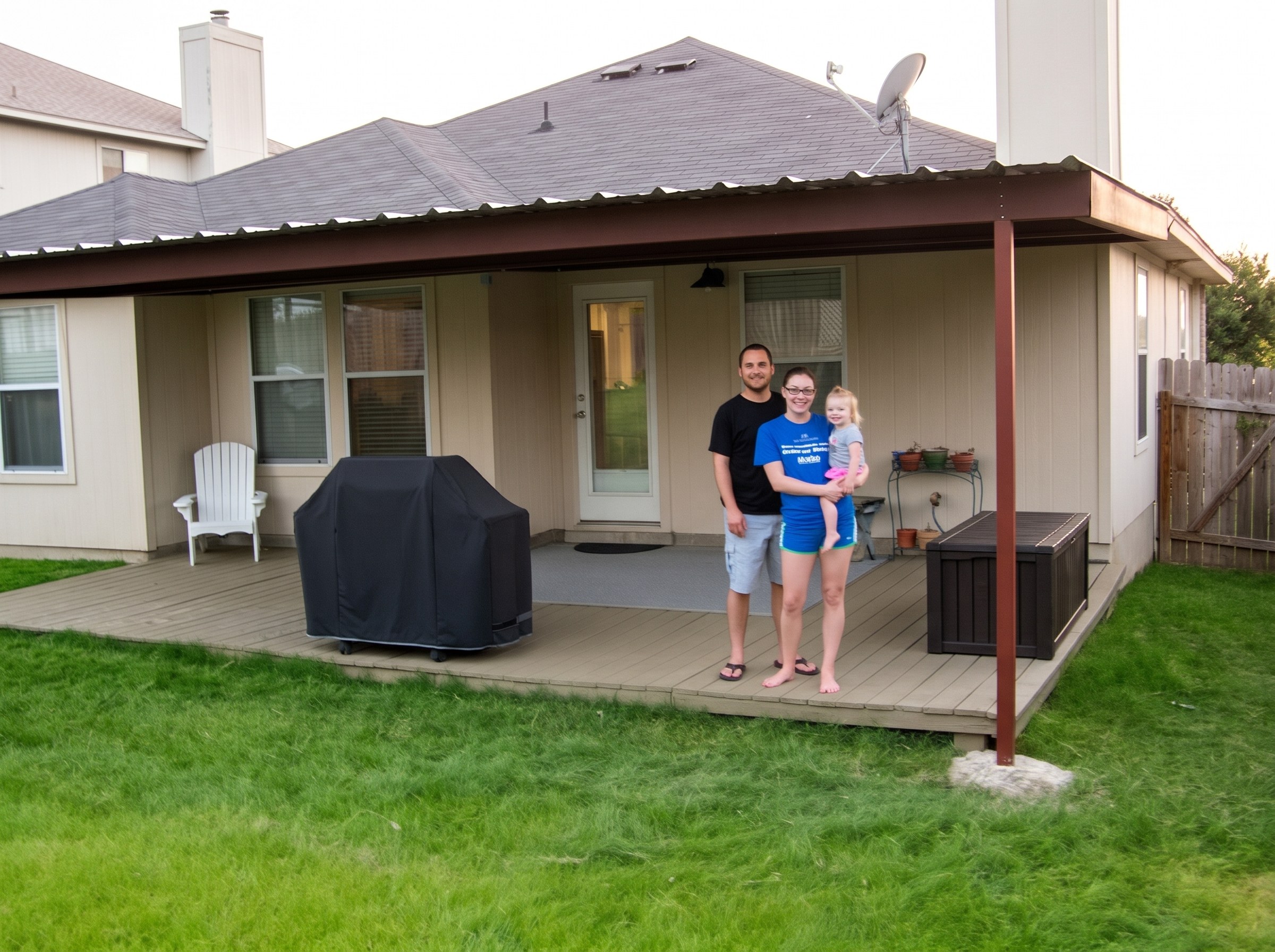 Attached steel patio cover over a deck on a house in San Antonio, Texas